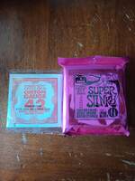 Vds Ernie Ball super Slinky 09-42 (4 jeux) neuf - 19 €
