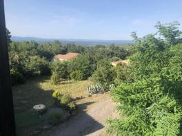 MAISON CONSTRUCTION EN BOIS SUR UN TERRAIN AVEC VUE DEGAGEE