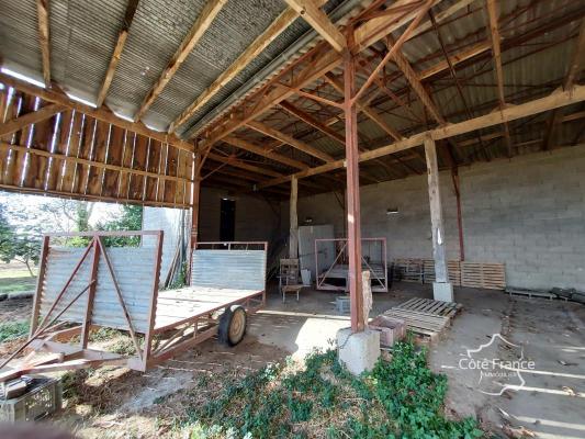 Propriété de 2 hectares comprenant une ferme et plusieurs dé