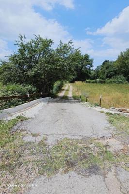 TERRAIN AGRICOLE PLAT  DE 1000 M2 ENVIRON PROCHE DU VILLAGE