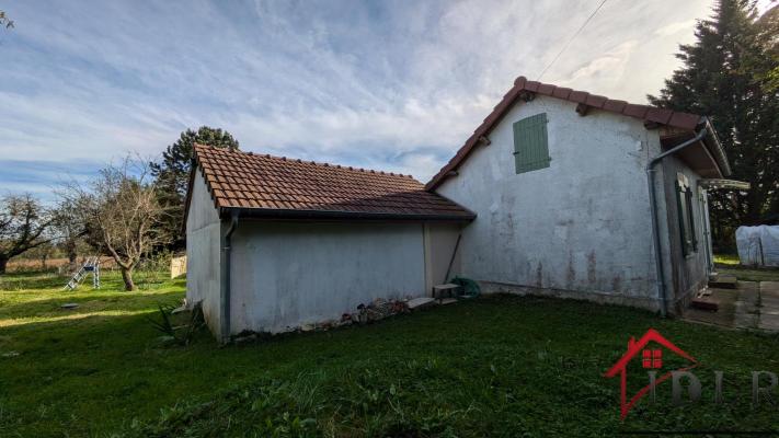 Maison au calme avec grand terrain