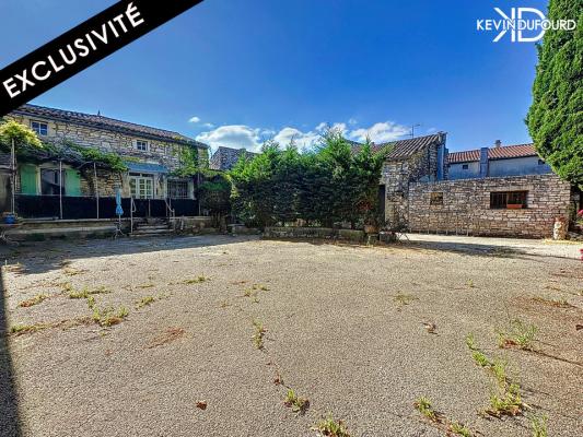 Ensemble immobilier ( 2 maisons + Hangar ) sur un terrain de