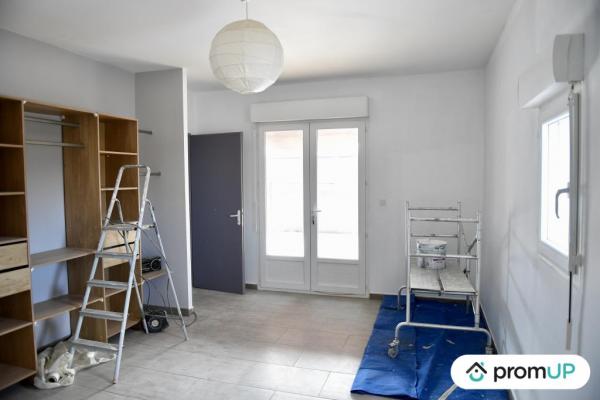 Local professionnel loué 405 m² avec habitation 107 m²