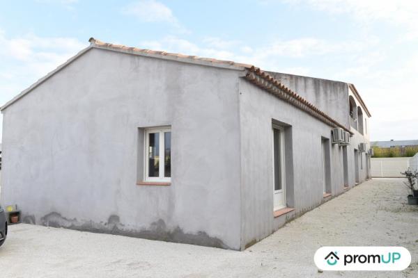 Local professionnel loué 405 m² avec habitation 107 m²