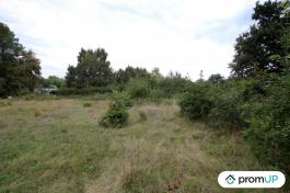 Terrain constructible de 689 m2 à AUREILHAN