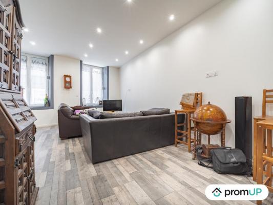 Immeuble de 320 m² vendu loué