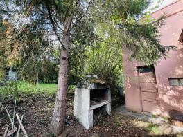 Maison individuelle avec jardin arboré et garage