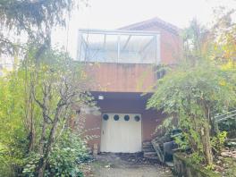 Maison individuelle avec jardin arboré et garage